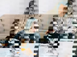 two women looking at computer at home