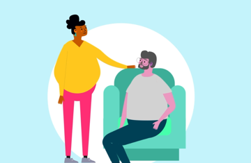 Carer placing hand on the shoulder of the person she cares for