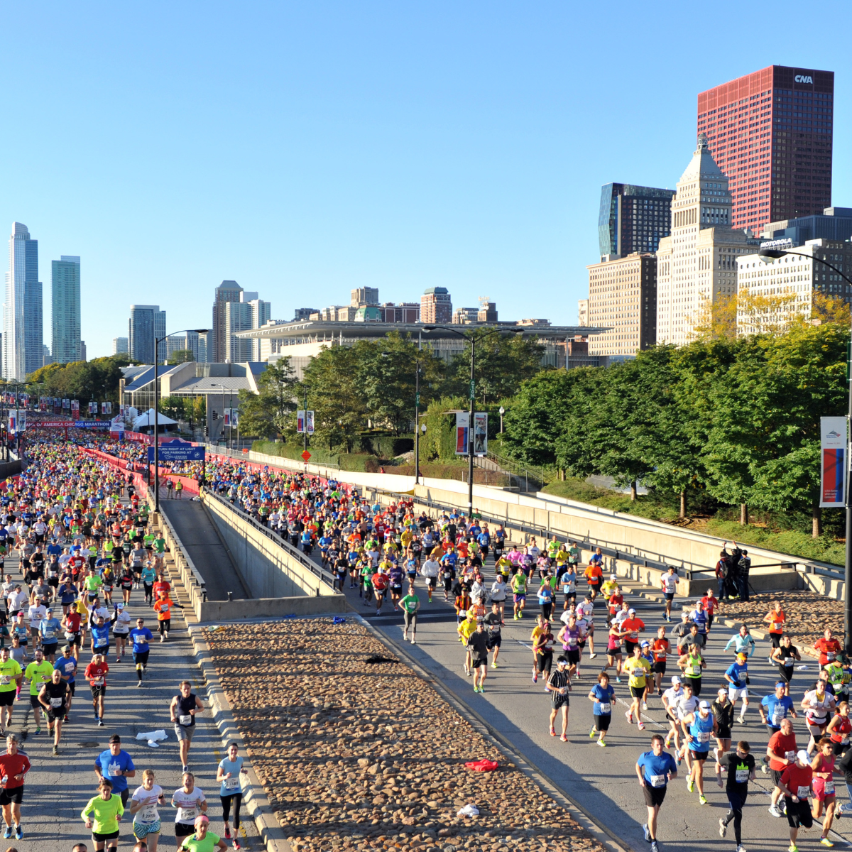Runners over an underpass in the city of Chicago